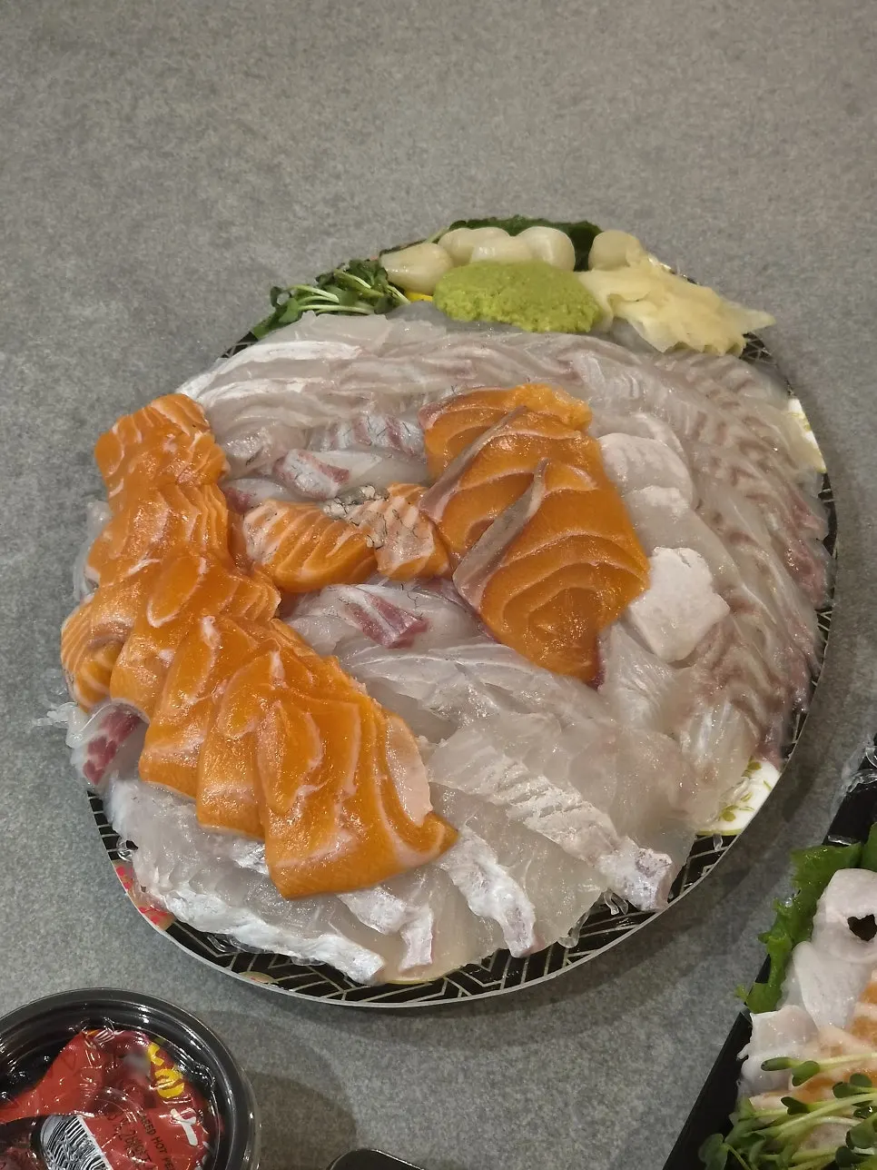 Sashimi takeout spread enjoyed at the lodging