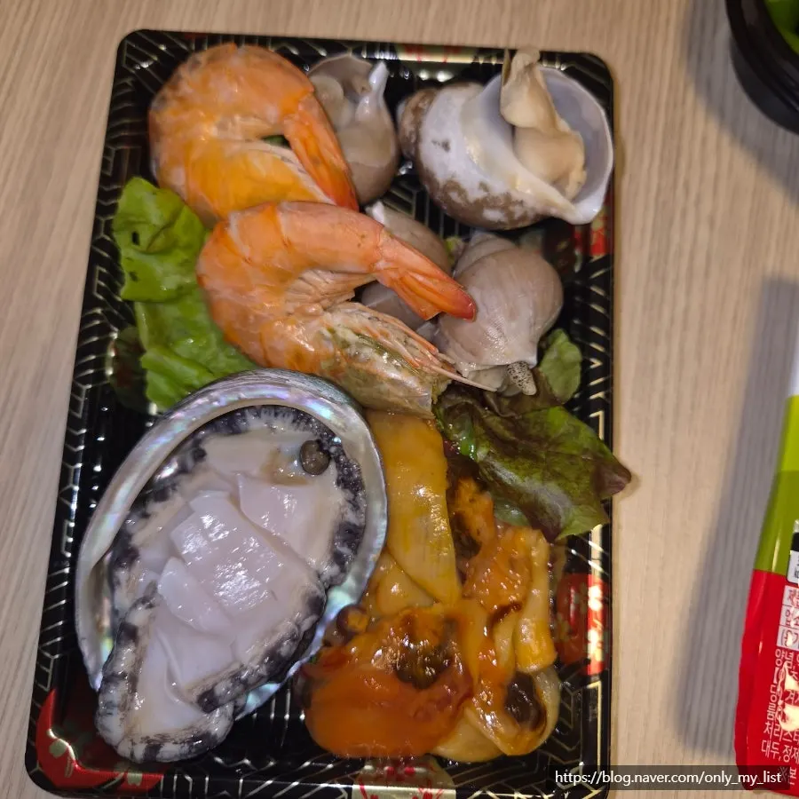 Picking up a piece of sashimi