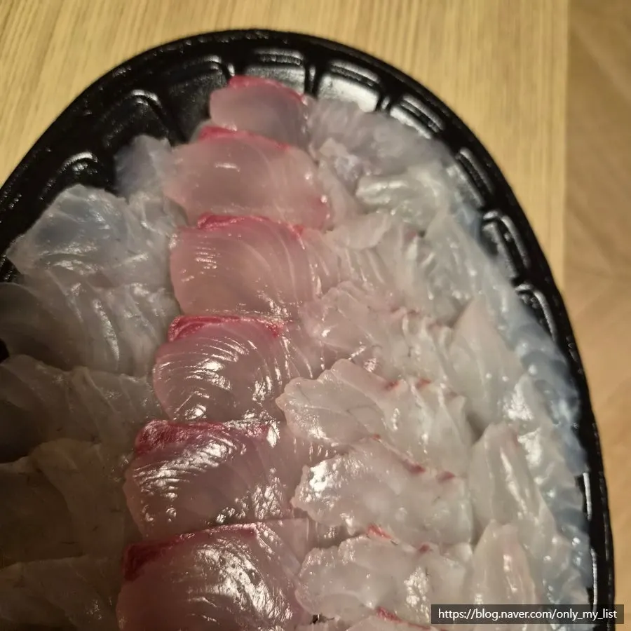 Final shot of the packed sashimi spread from Ilchul Hoetjip