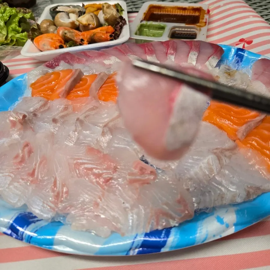 Takeaway sashimi spread with seafood