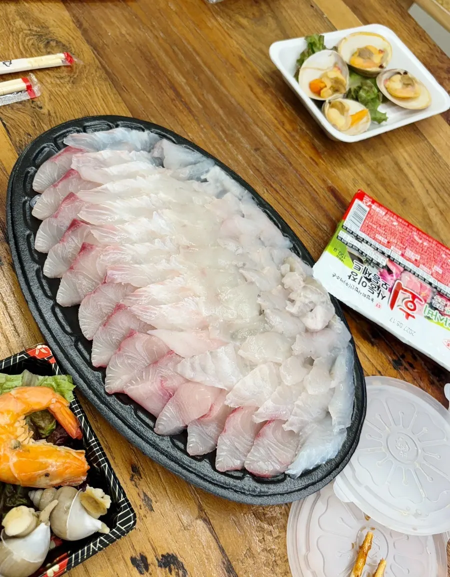 Ilchul Special Assorted Sashimi in takeout containers