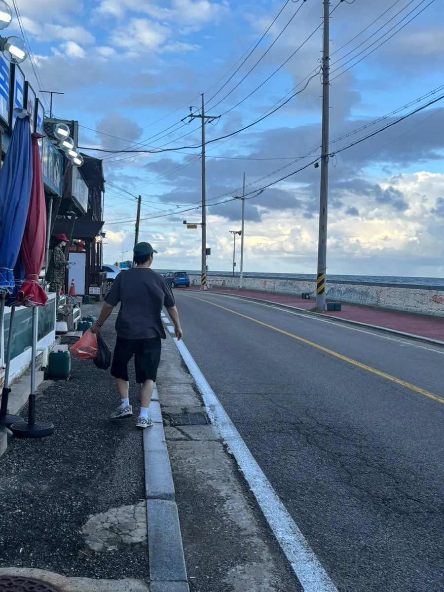 Walking back to our lodging with the sashimi takeaway