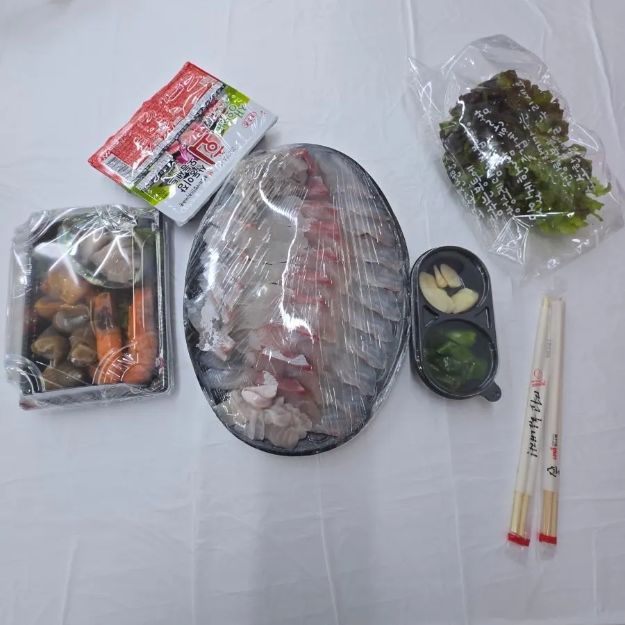 The sashimi spread set out at home