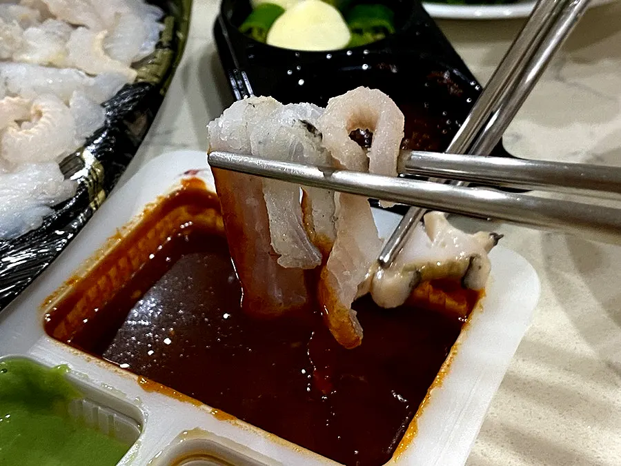 A piece of flounder sashimi
