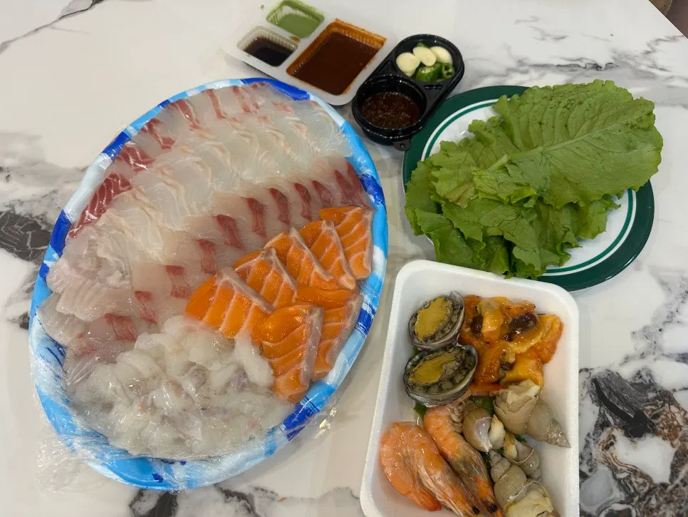 The medium mixed sashimi platter takeout spread