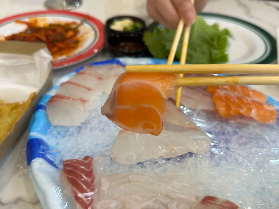 Close-up of the mixed sashimi showing its thickness