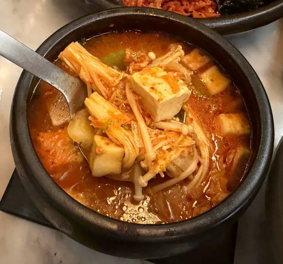 Doenjang jjigae with enoki mushrooms and tofu