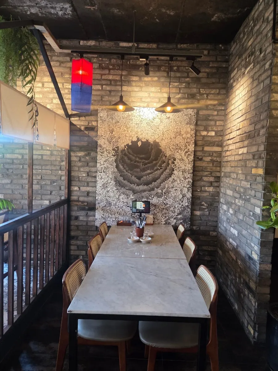 Interior of Ju Myeongdang lit with dark-toned lighting