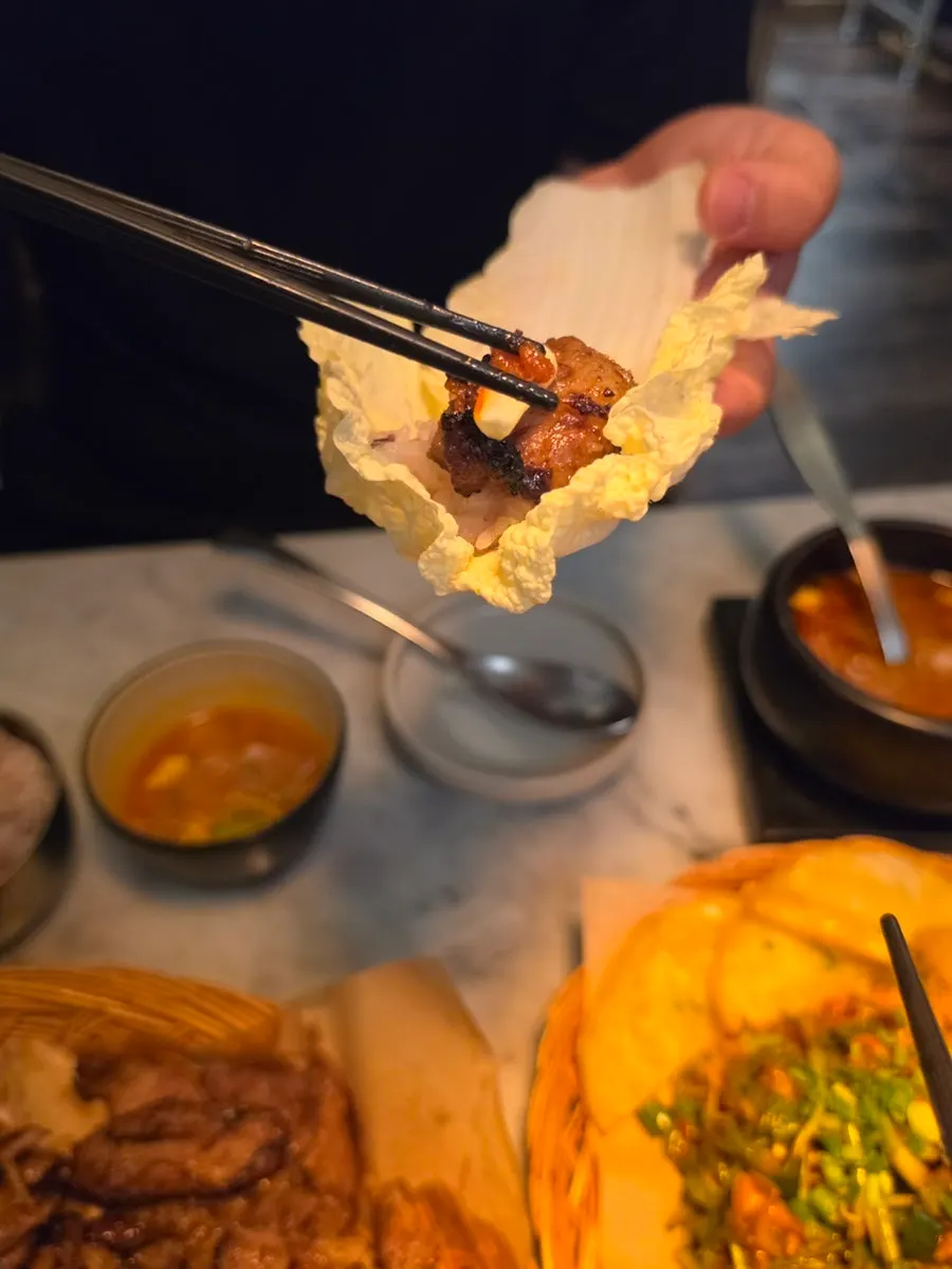 Meat wrapped in a lettuce leaf