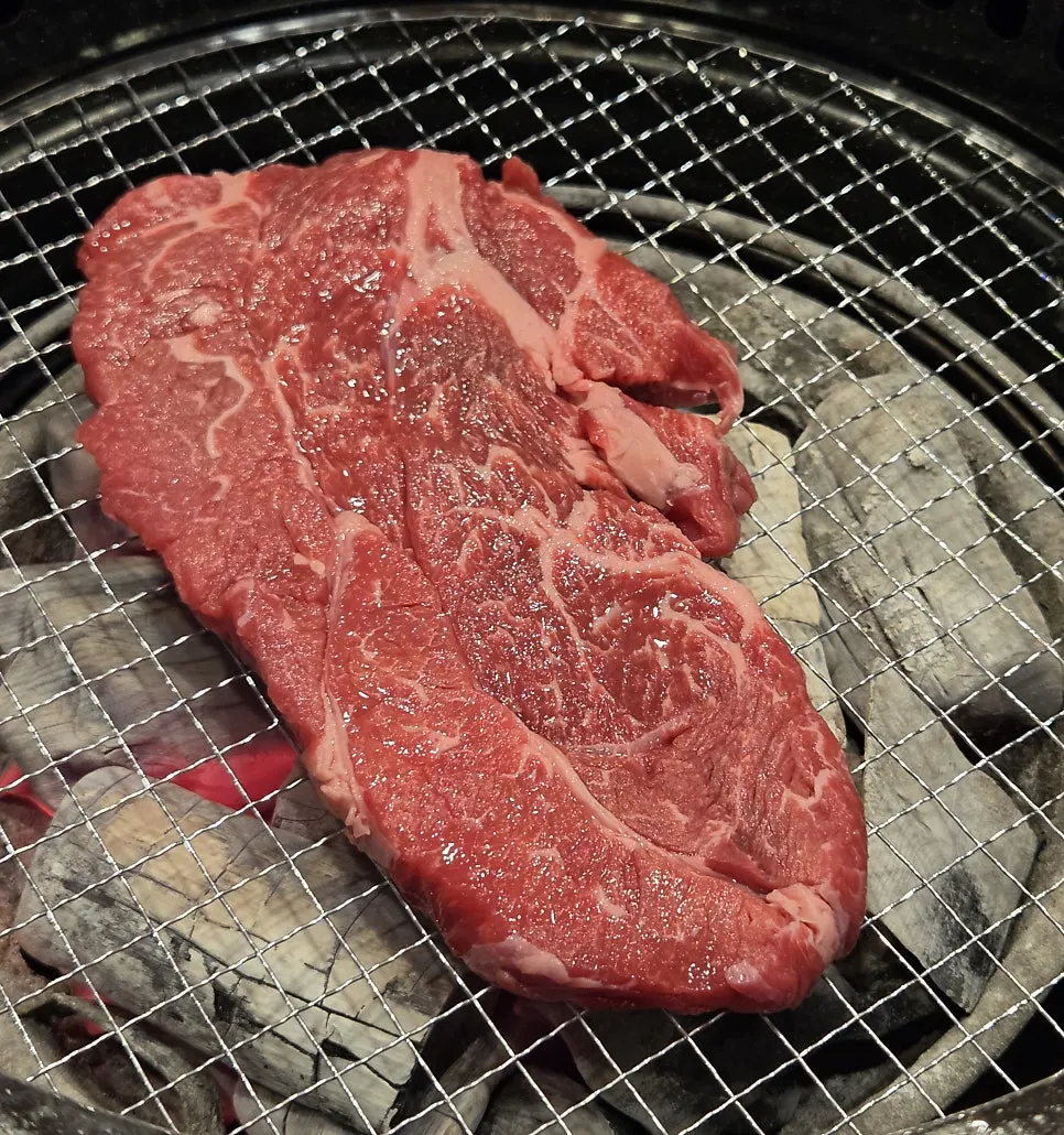Vivid red beef with dense marbling