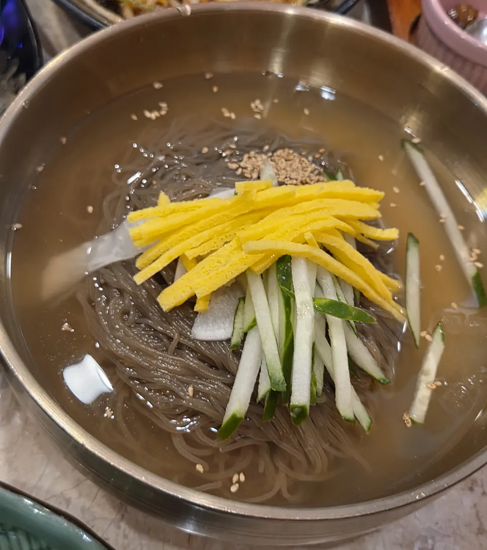 Mul naengmyeon topped with slushy ice