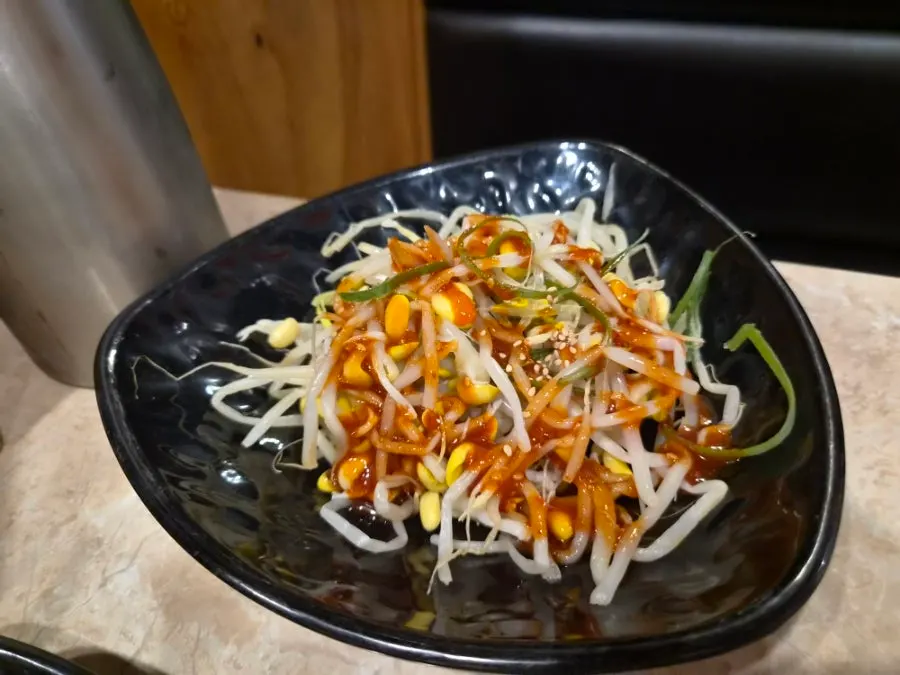 Table with basic banchan and scallion salad