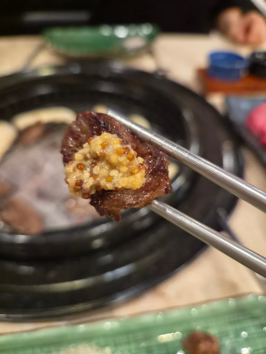 Grilled beef resting on the round tray