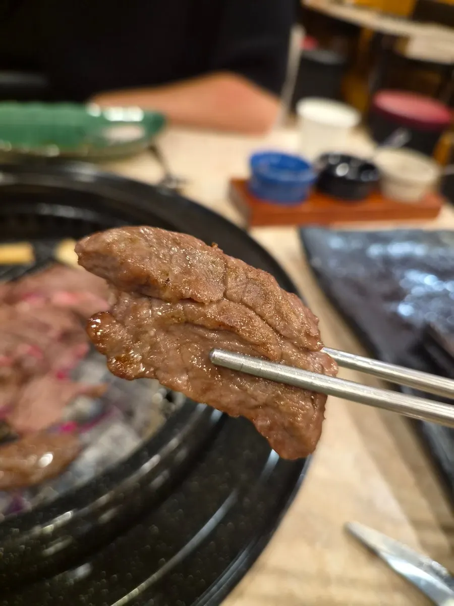Charcoal-grilled beef topped with sauce