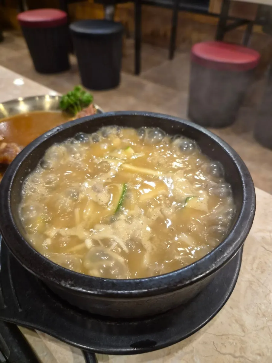 Beef doenjang sulbap bubbling in a stone pot