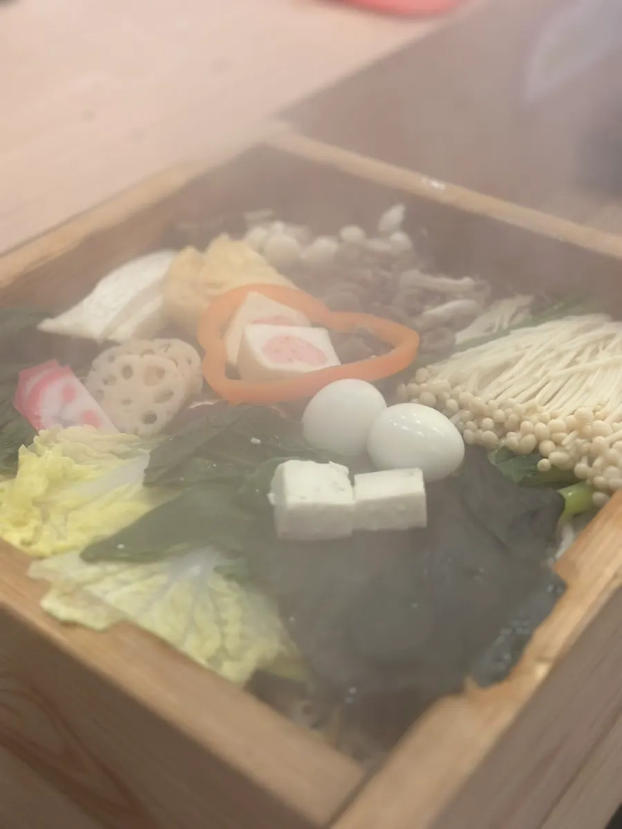 Close-up of steaming seiro-mushi vegetables