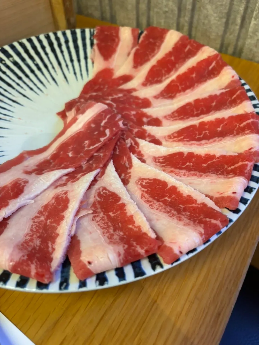 Elegantly presented shabu-shabu meat
