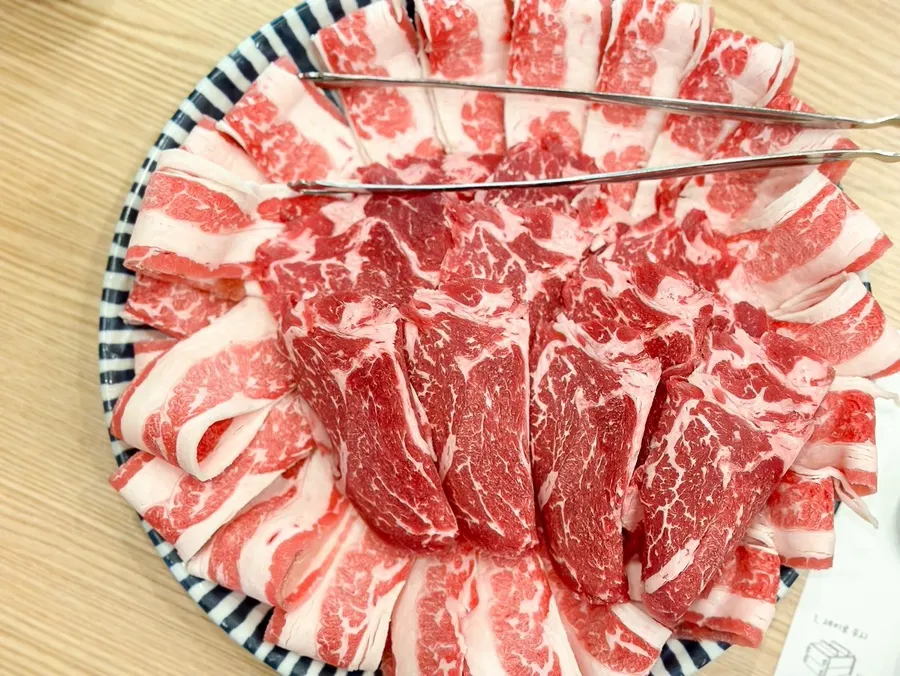 Shabu-shabu served onto individual small plates