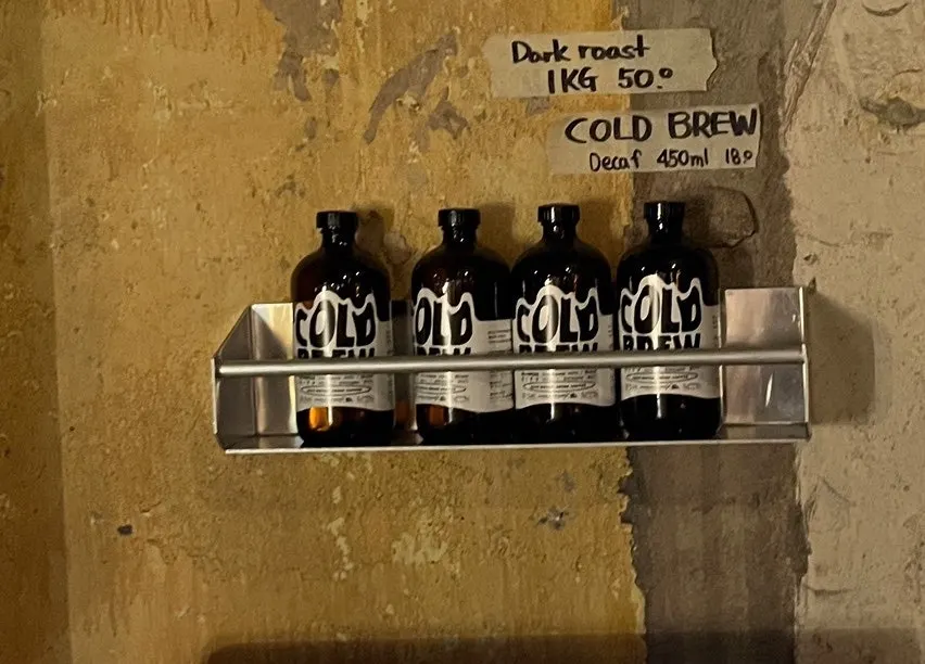Shelf of cups and other small goods