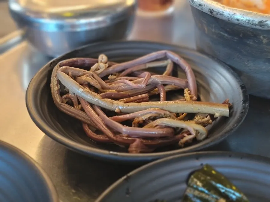 Utensils neatly arranged at the self-serve bar