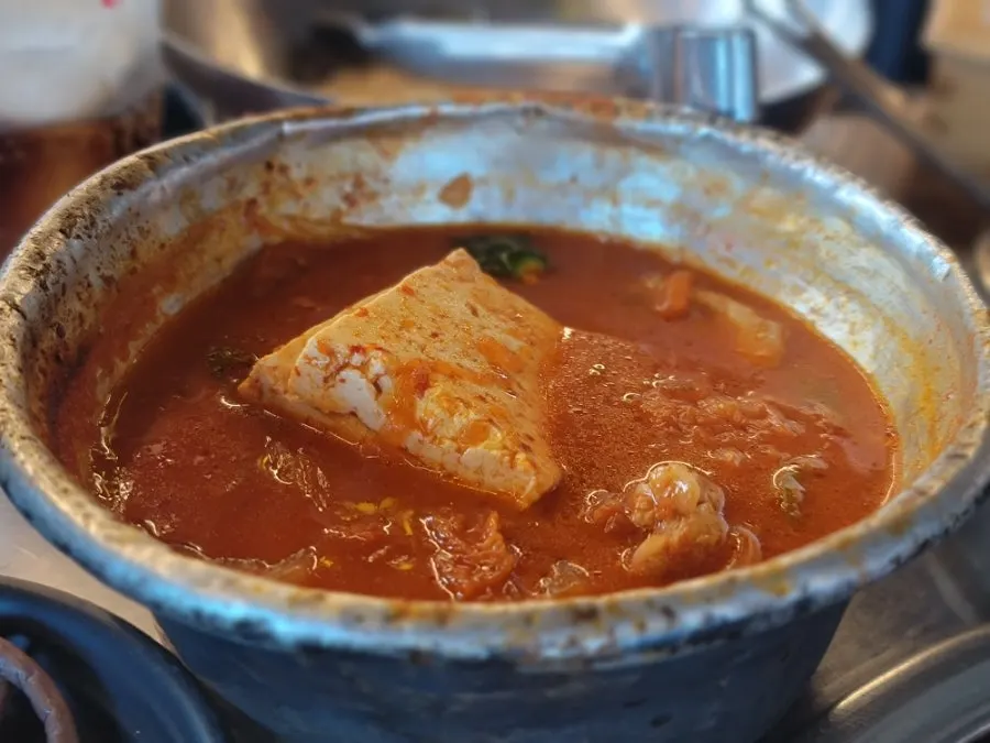 Kimchi jjigae simmered in a yangeun pot