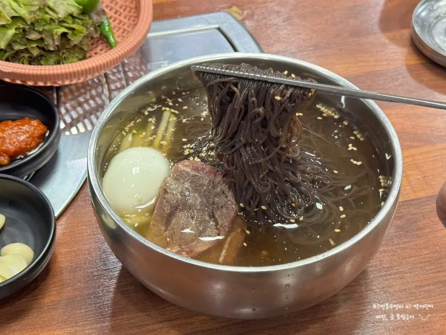 Mul naengmyeon topped with arongsatae beef shank