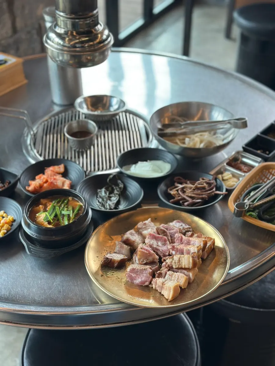 Black pork grilled by a staff member