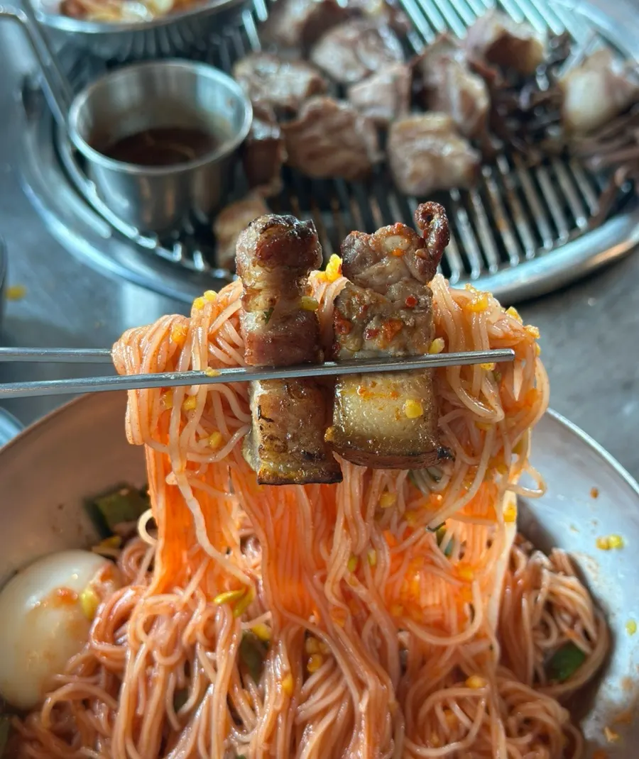 Bibim-guksu served with black pork neck