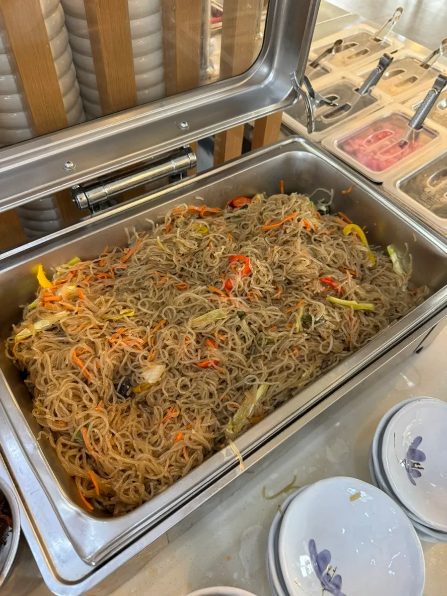 Tray of japchae and pork bulgogi at the self-serve bar
