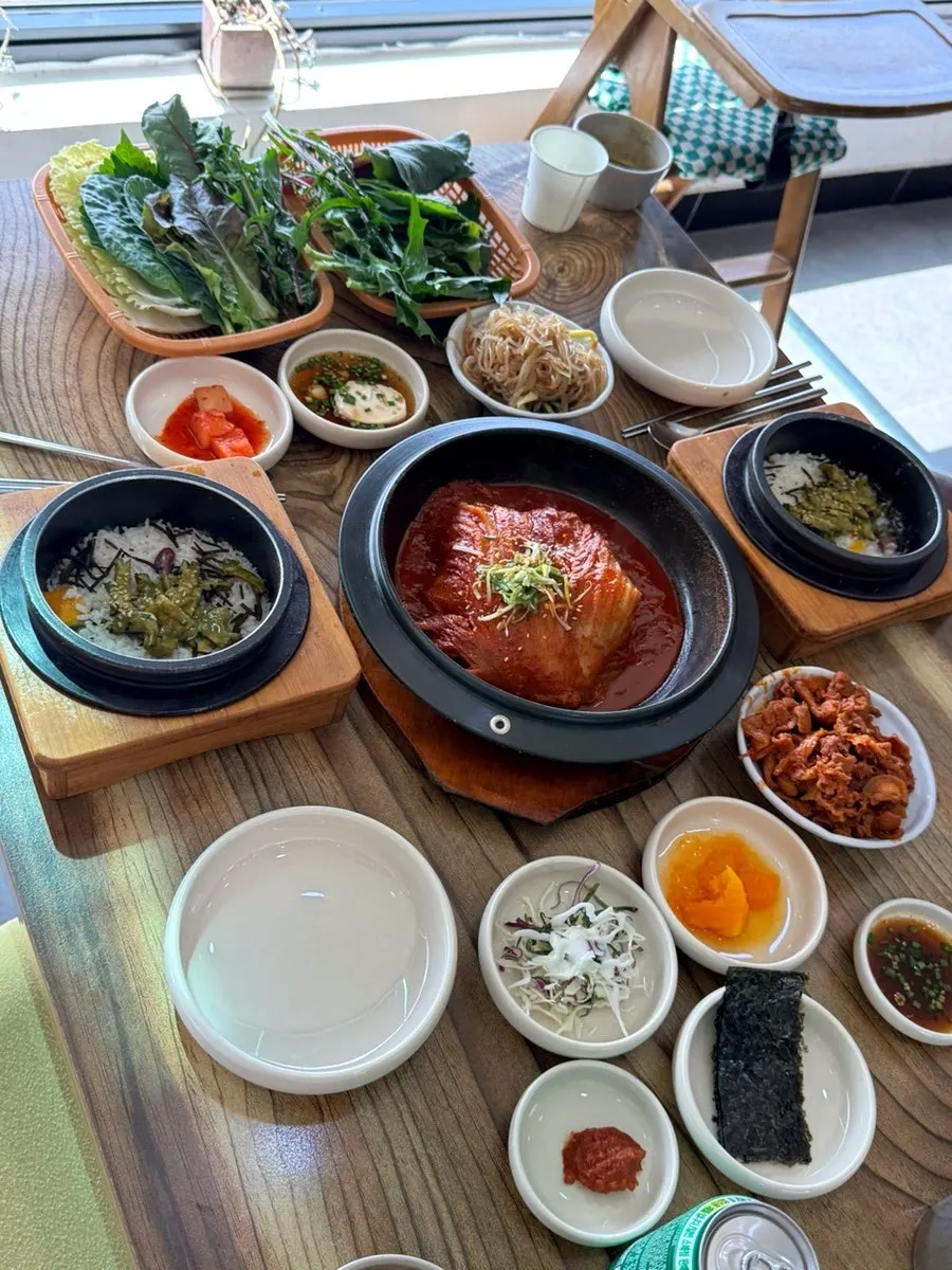 Pot of aged kimchi-braised mackerel wrapped in kimchi
