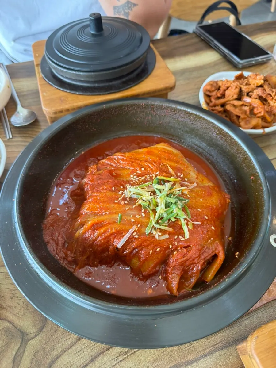 Four pieces of mackerel inside the aged kimchi