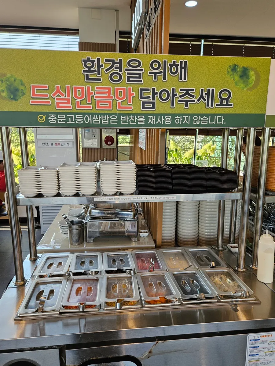 Covered side dishes at the self-serve bar