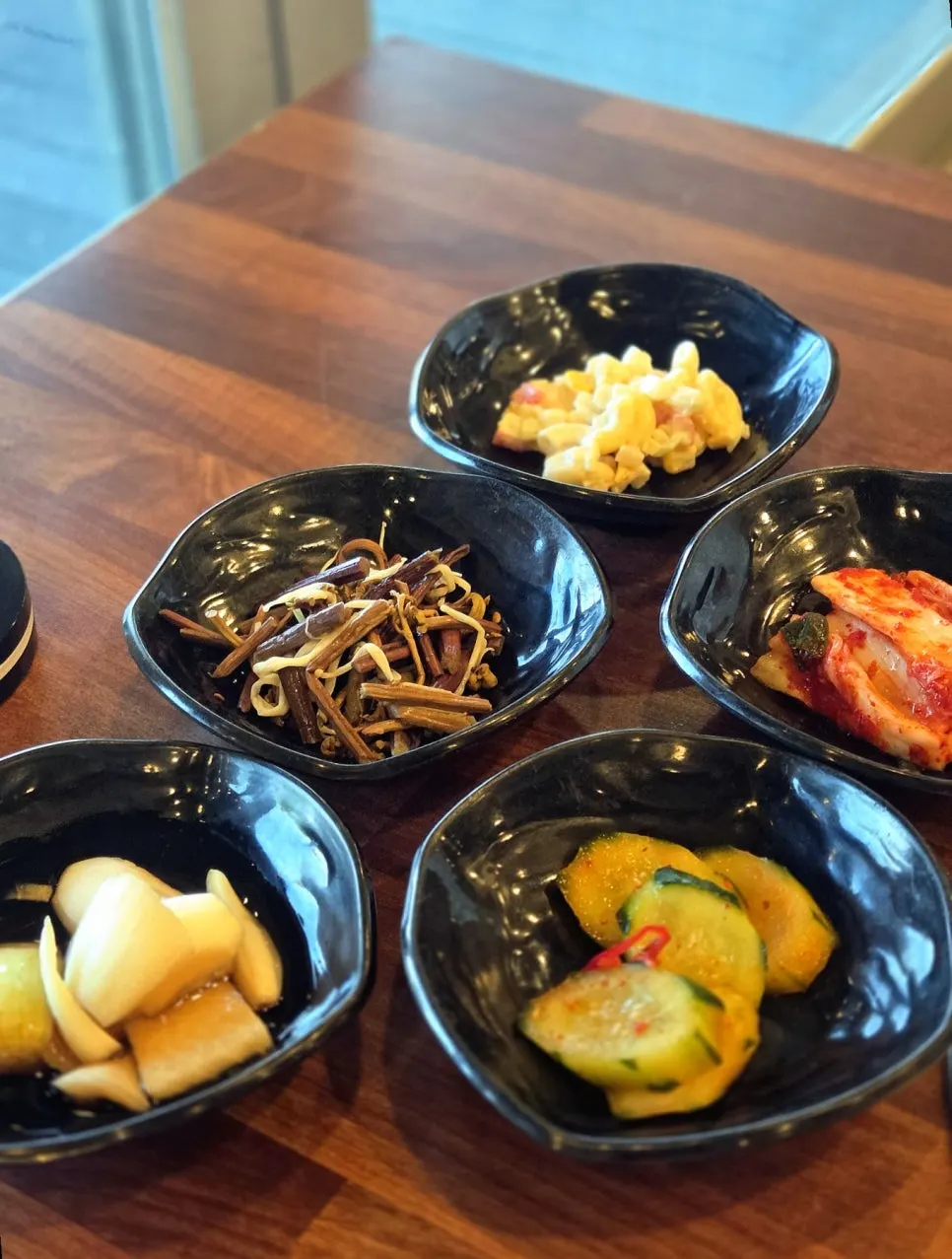 Basic side dishes including pickled onion and bracken fern namul