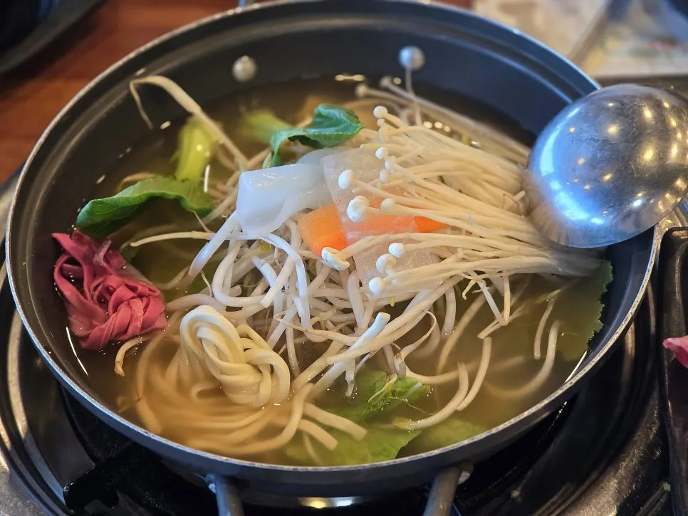 Pot of horse meat shabu-shabu served at the end of the course