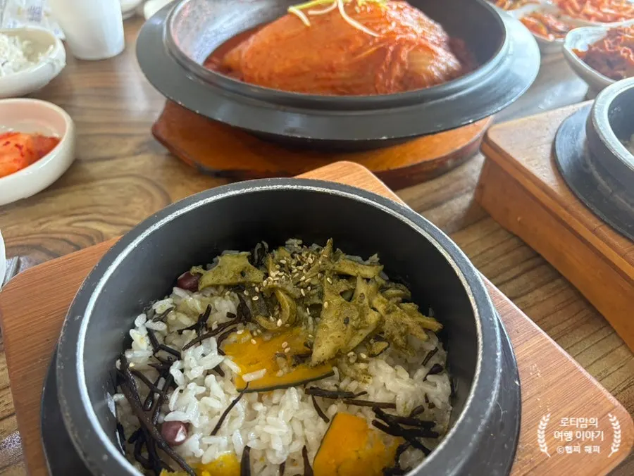 Abalone hot pot rice eaten alongside the mackerel ssam-bap