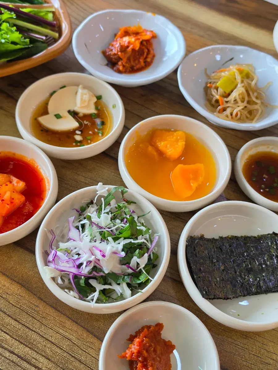 Basic side dishes including kimchi and soft tofu