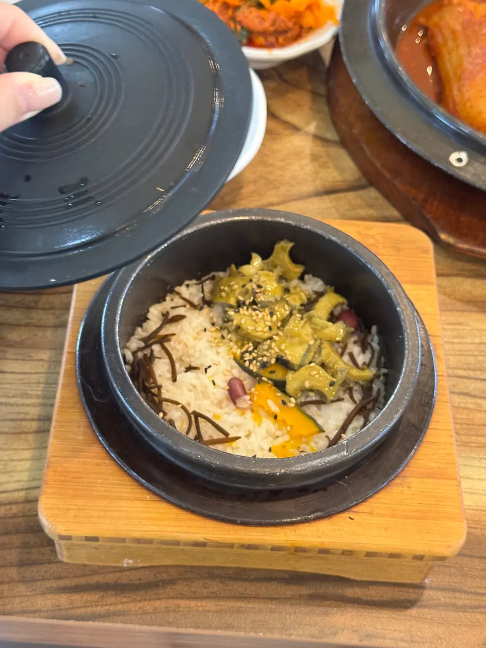 Pot of cut old kimchi and braised mackerel