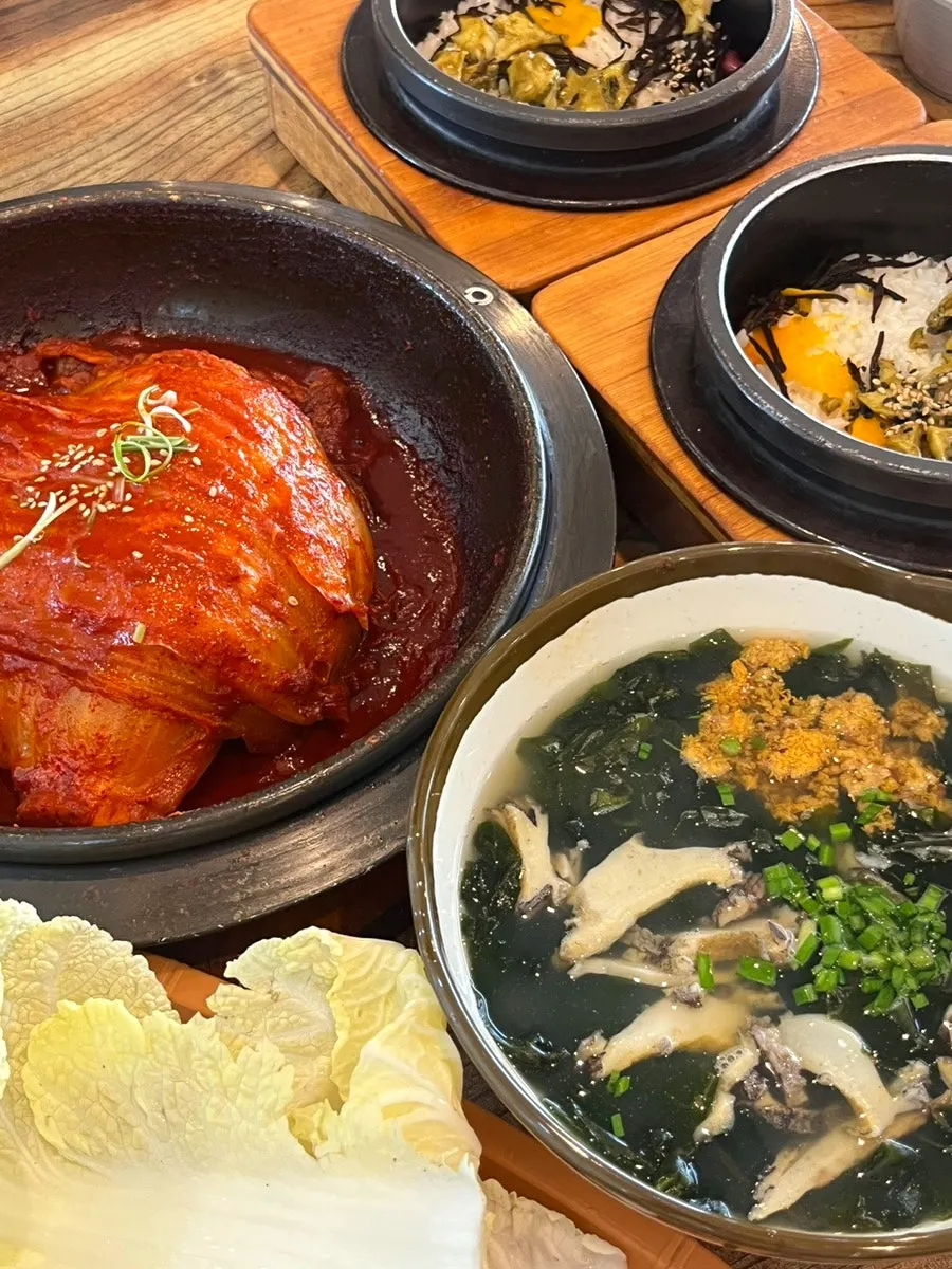 Abalone hot-stone rice served in a stone pot