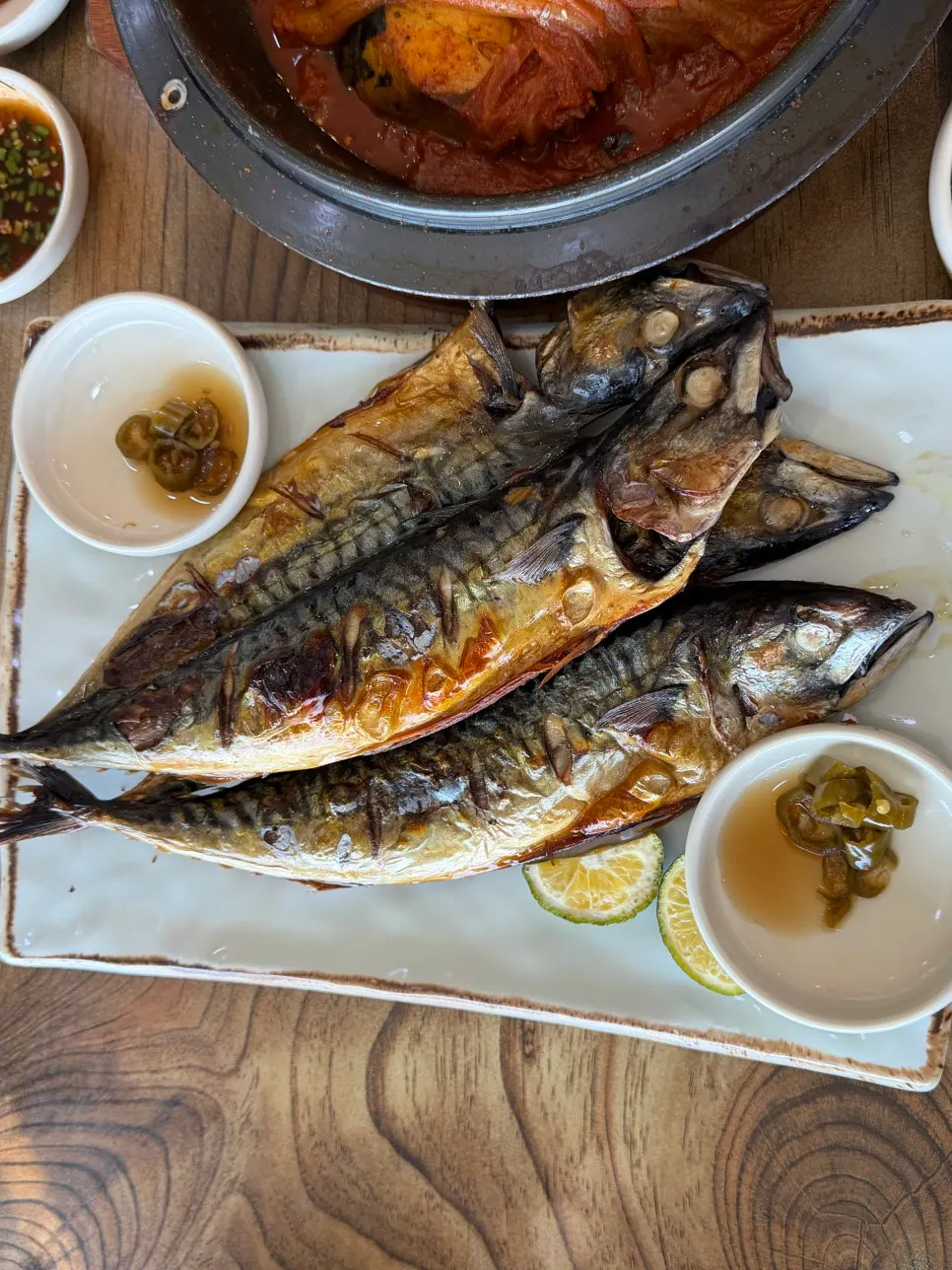 Old kimchi mackerel wrapped in cabbage as a ssam