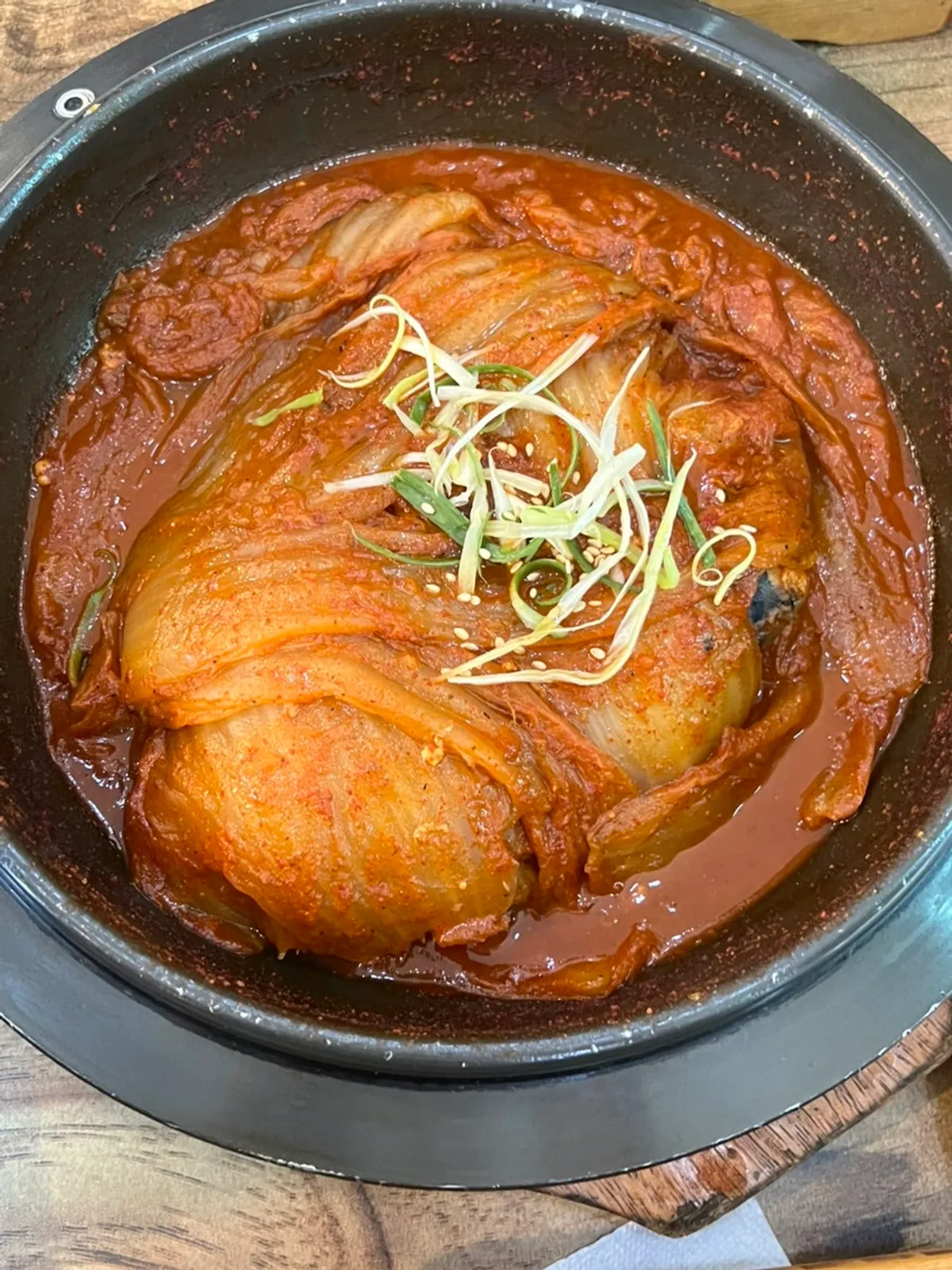 Full spread of old kimchi mackerel ssam-bap and abalone hot-pot rice set