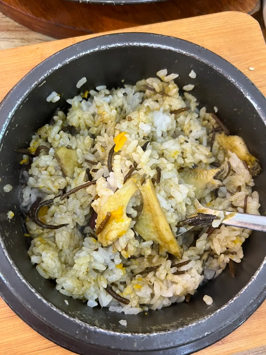 Close-up of freshly cooked abalone hot-pot rice