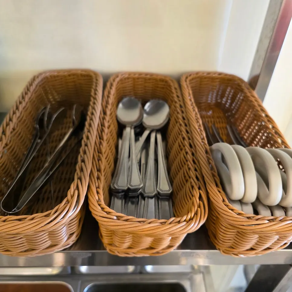 Jalapeño and pickle containers at the self-serve bar