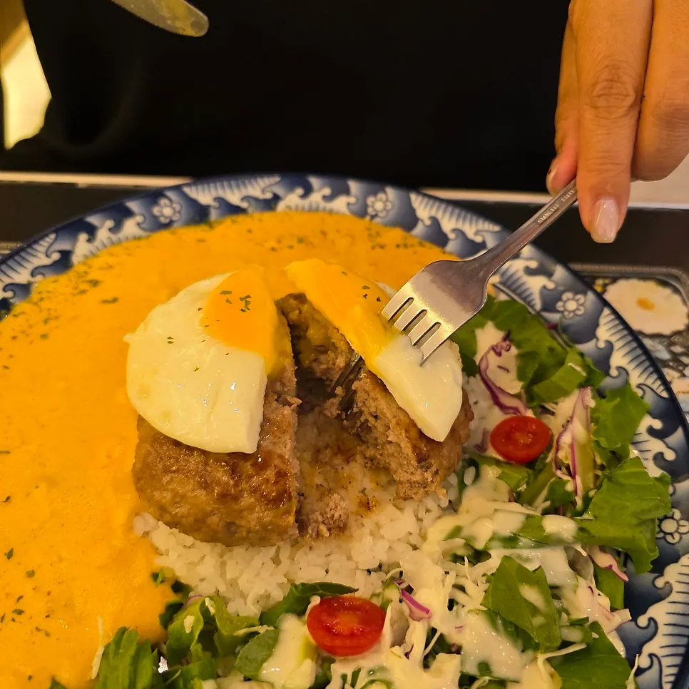 Cross-section of Toowoomba hambak with spicy cream sauce
