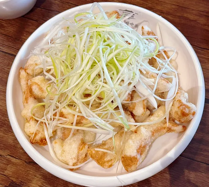 Pork tenderloin sweet and sour pork with a thin, crispy batter