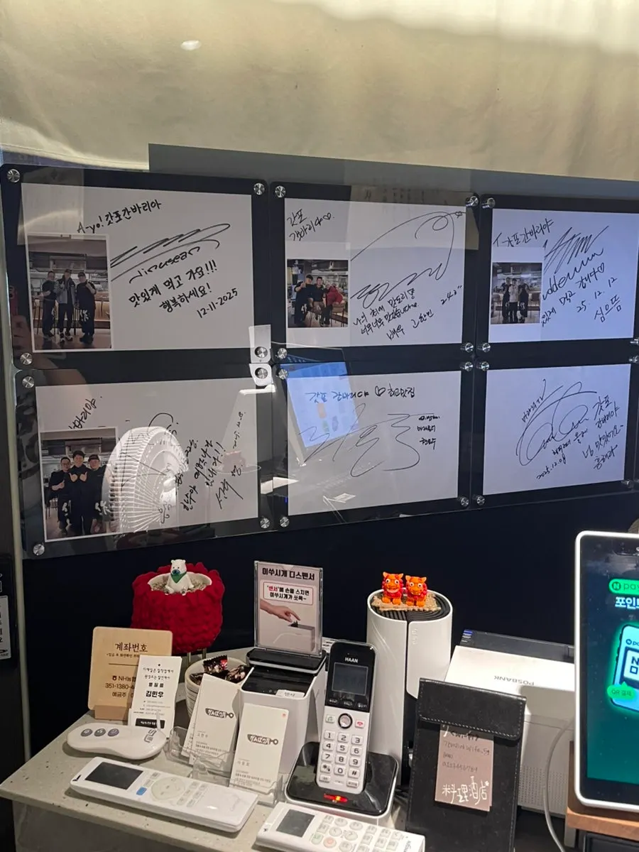 Owner chef's culinary school diploma and cooking license on display