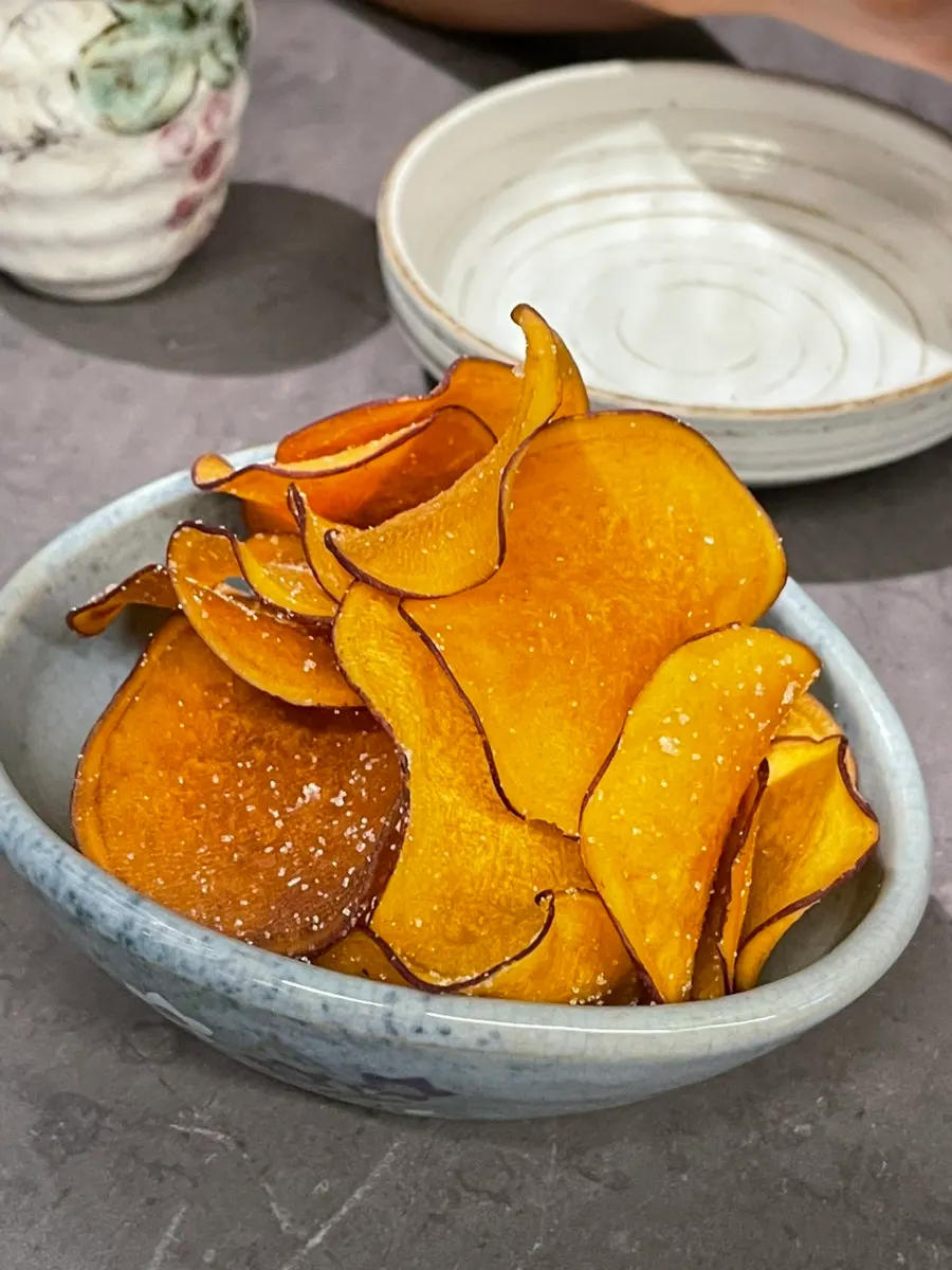 House-made sweet potato tempura served as the default snack