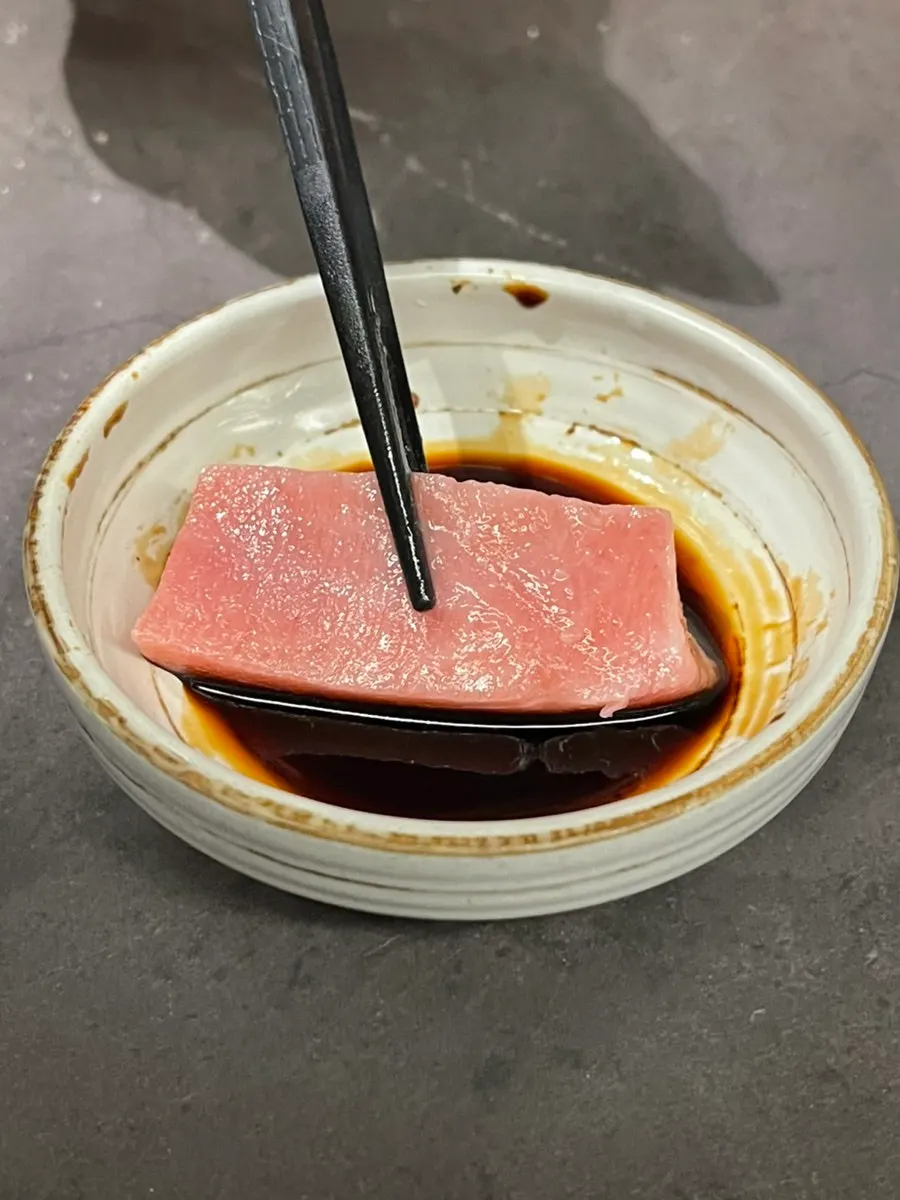 Thickly sliced tuna and salmon sashimi