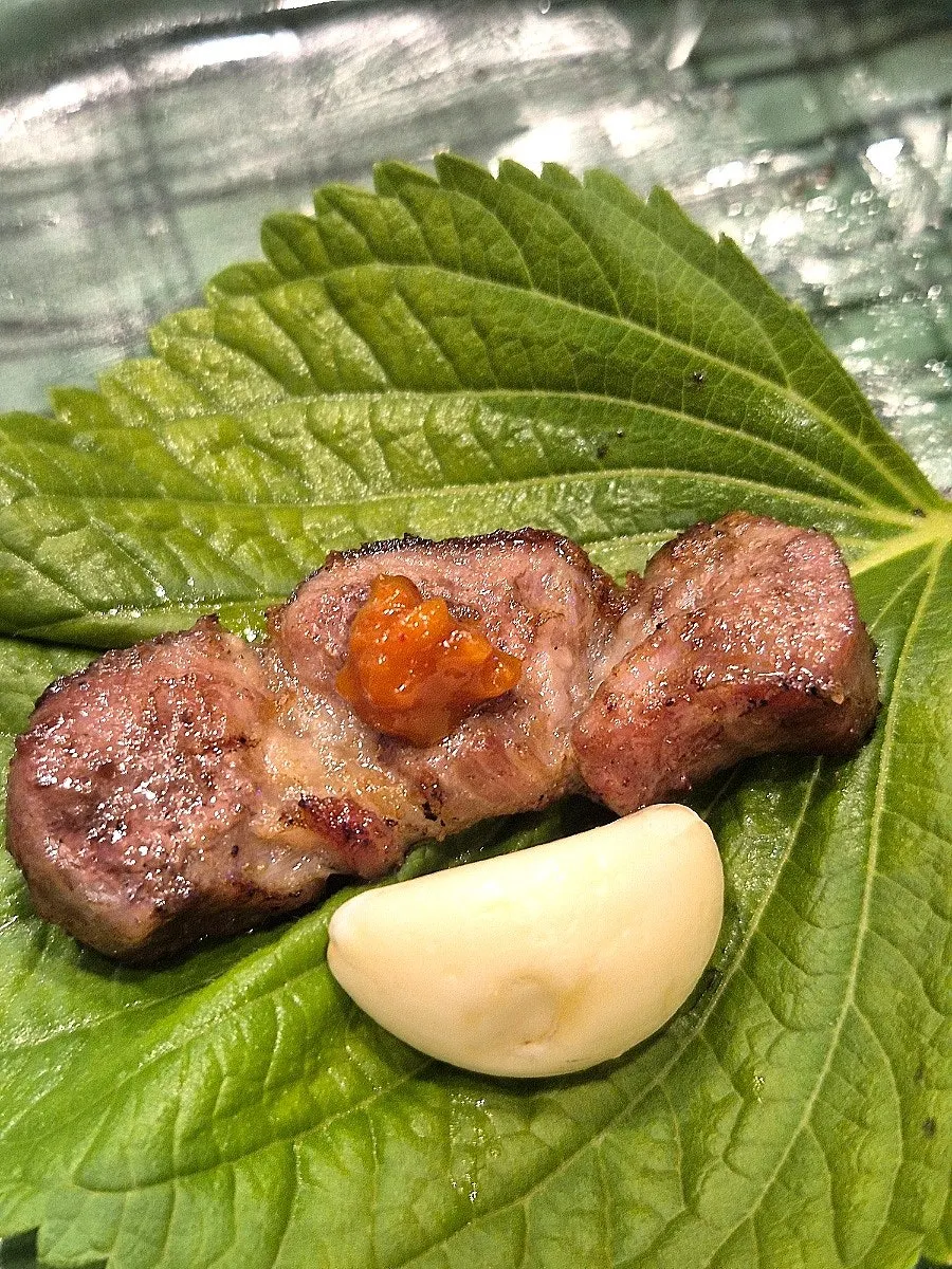 Iberico black pork grilled and wrapped in perilla leaf