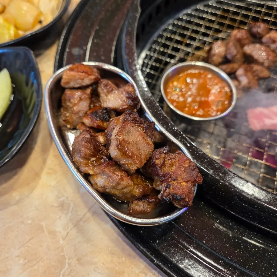 A grilled piece of pork jowl
