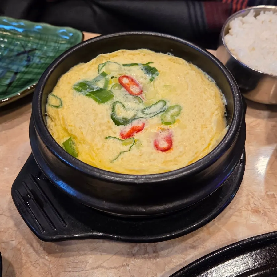 Steamed egg in an earthenware pot